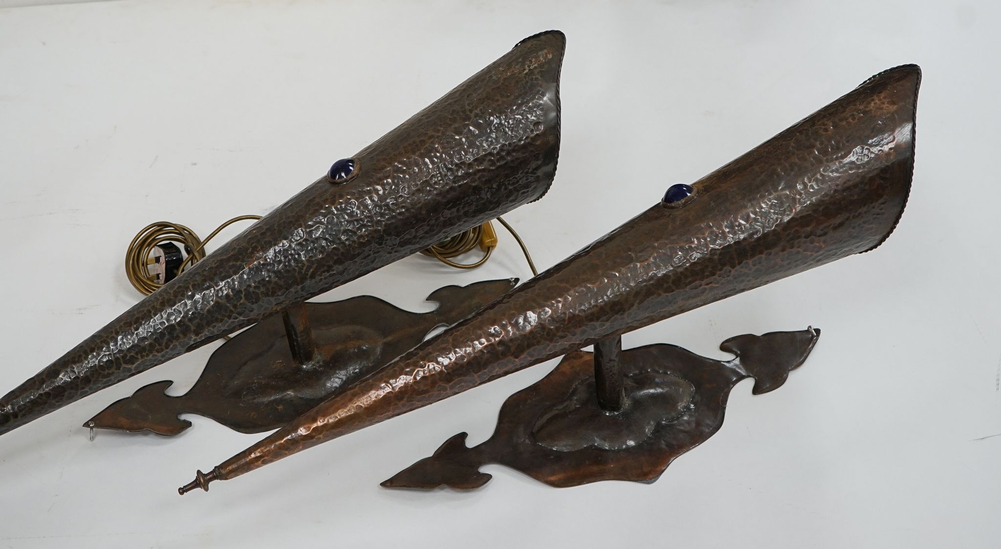 A large pair of Arts & Crafts-style hammered copper wall lights, 85.5cm